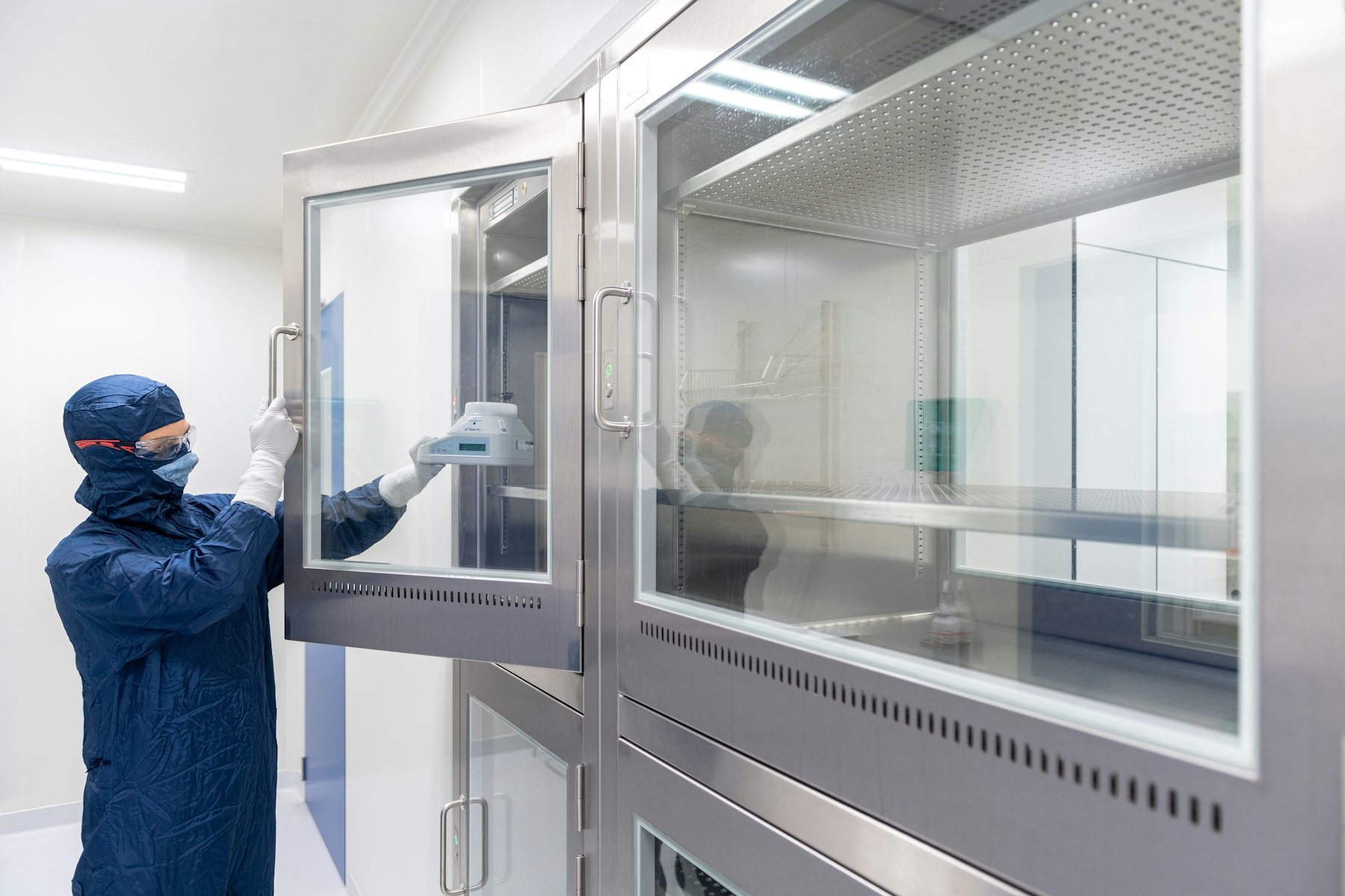 Technician in a pharmaceutical cleanroom